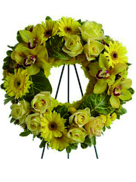 corona di orchidee, rose e gerbere gialle